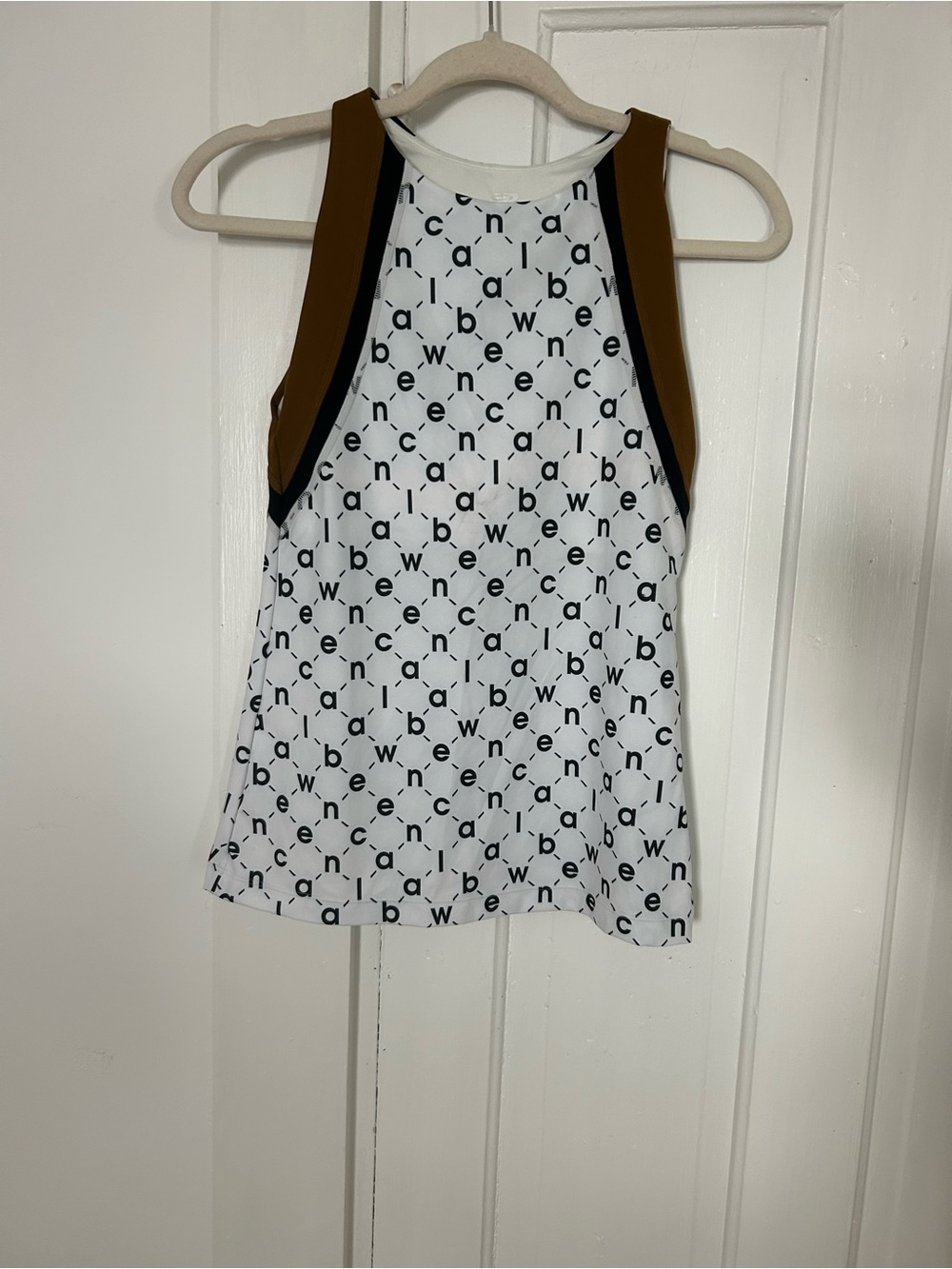 New Balance White Tank Top with Black Logo Pattern and Brown Straps